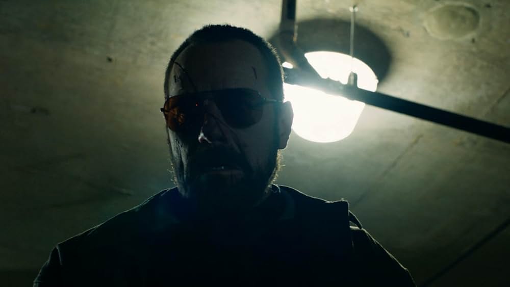 凍える夜に、盲目の殺し屋トポの画像