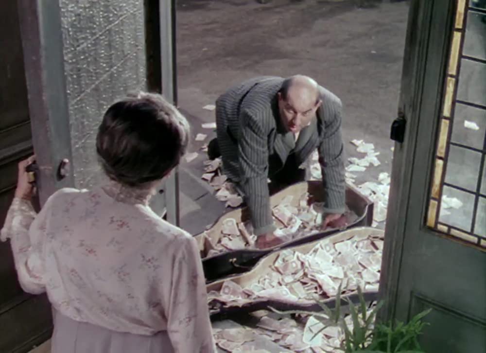 マダムと泥棒の画像