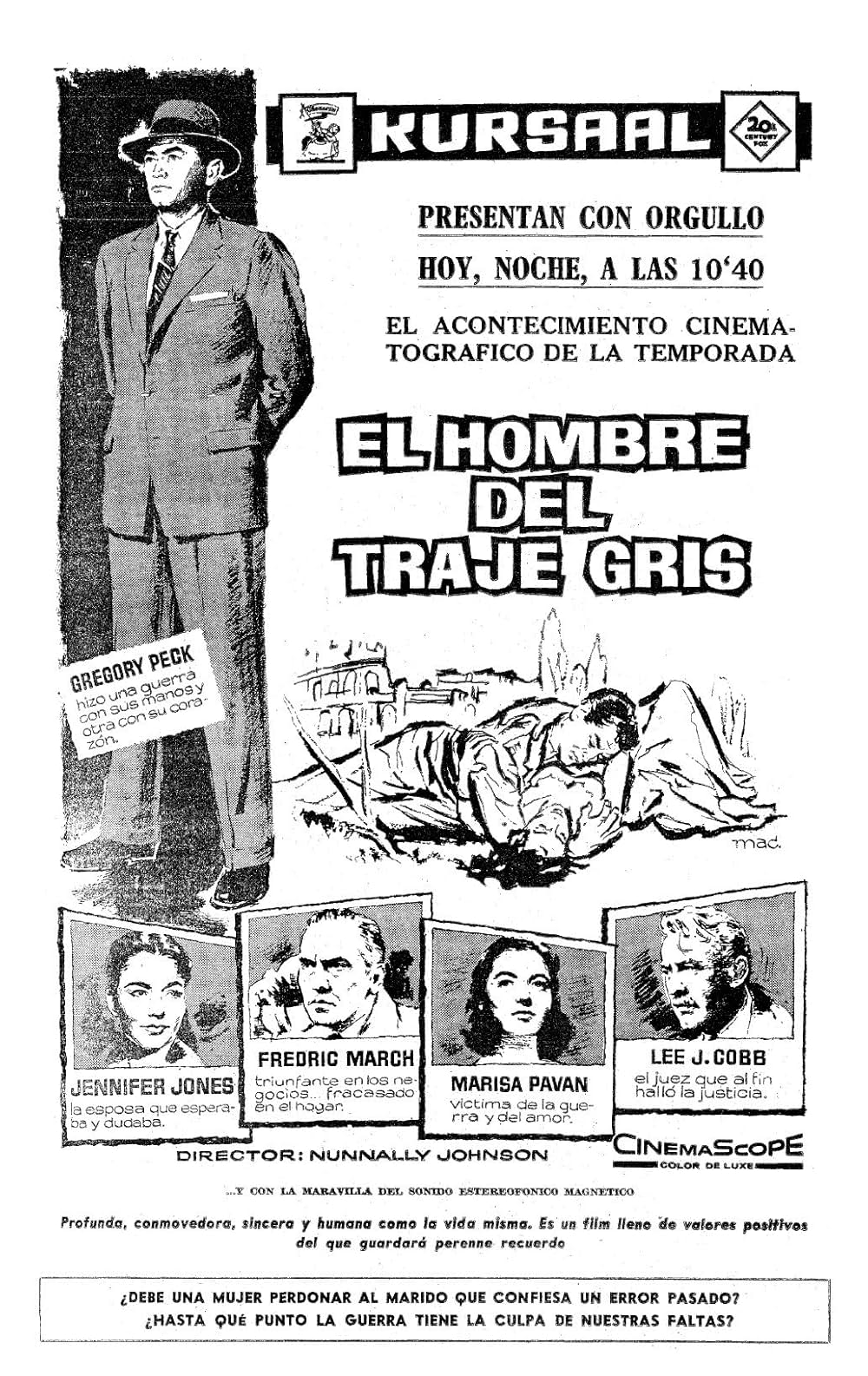 灰色の服を着た男の画像