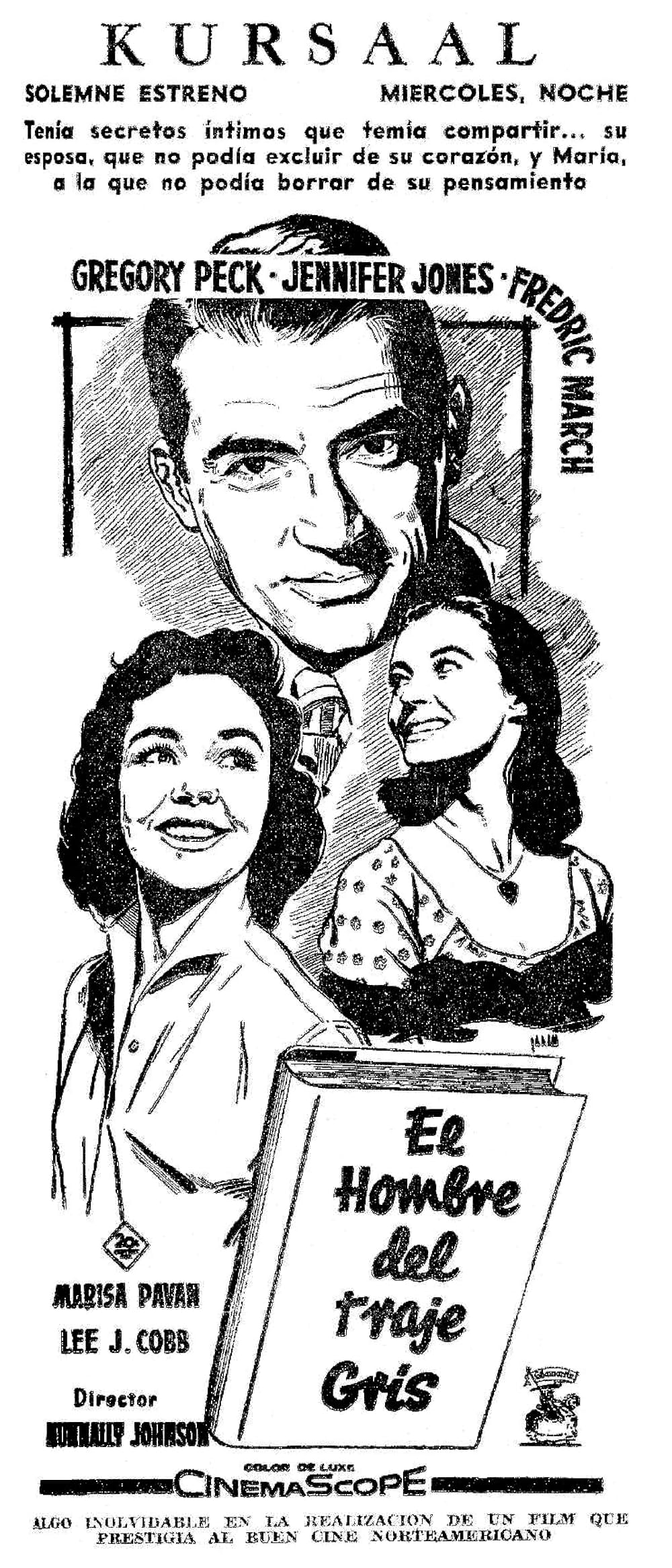 灰色の服を着た男の画像