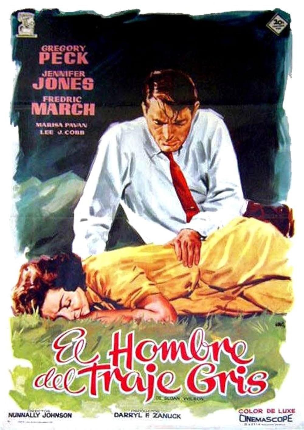 灰色の服を着た男の画像