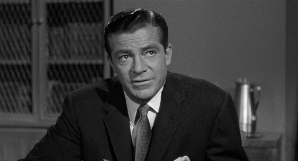 恐怖を売る男達の画像