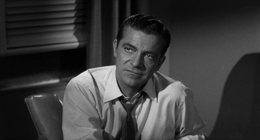 恐怖を売る男達の画像