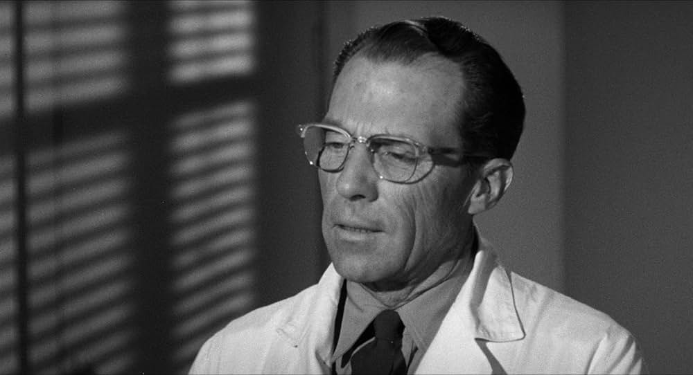 恐怖を売る男達の画像