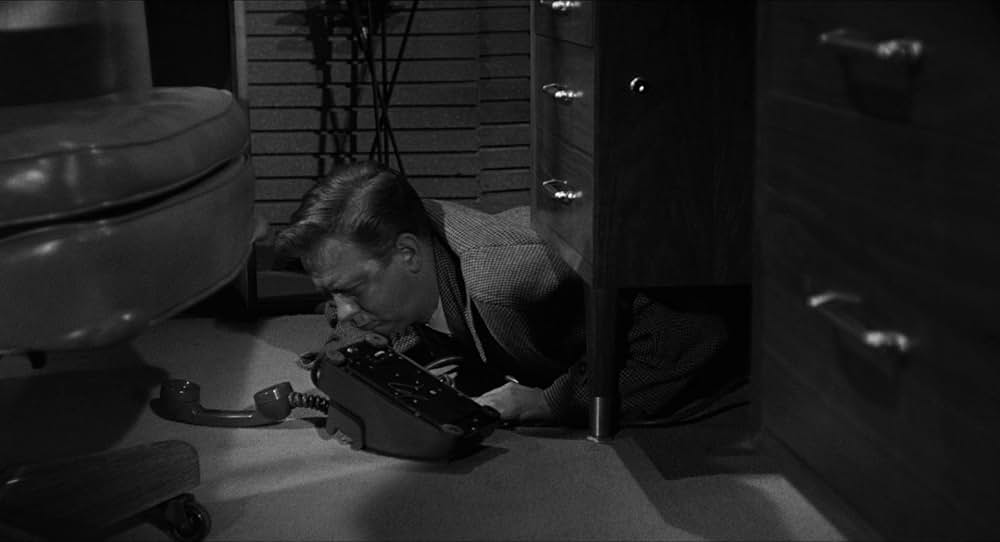 恐怖を売る男達の画像