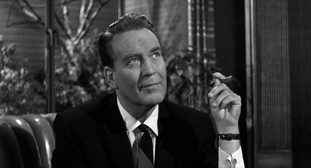 恐怖を売る男達の画像