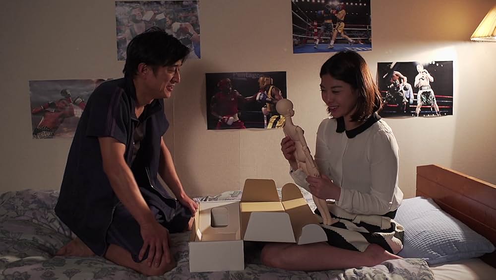 変身人形 肢体を愛でる指先の画像