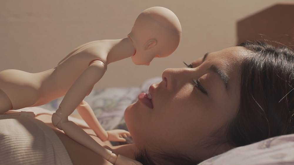 変身人形 肢体を愛でる指先の画像