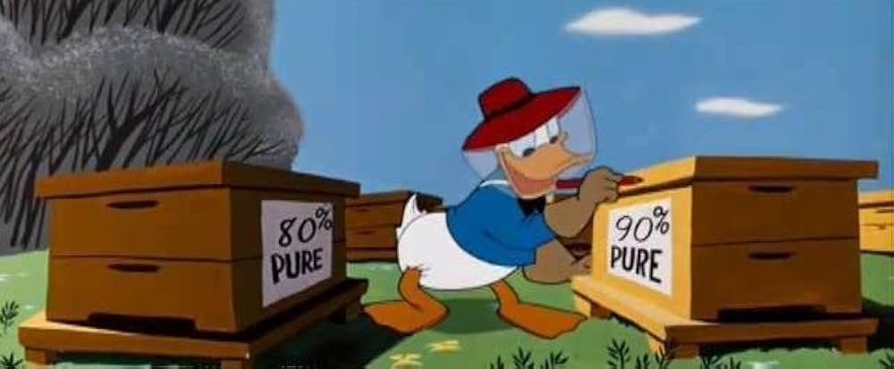 クマとみつばち／クマ公とミツバチの画像