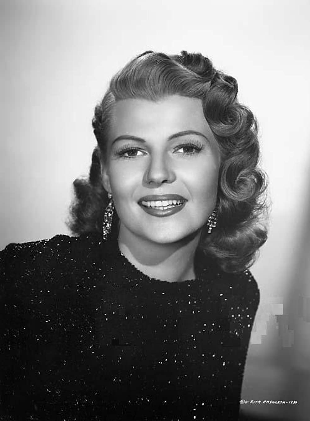 「醜聞（スキャンダル）殺人事件」リタ・ヘイワースの画像