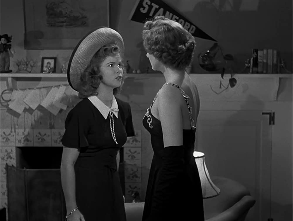 「独身者と女学生」シャーリー・テンプル & マーナ・ロイの画像