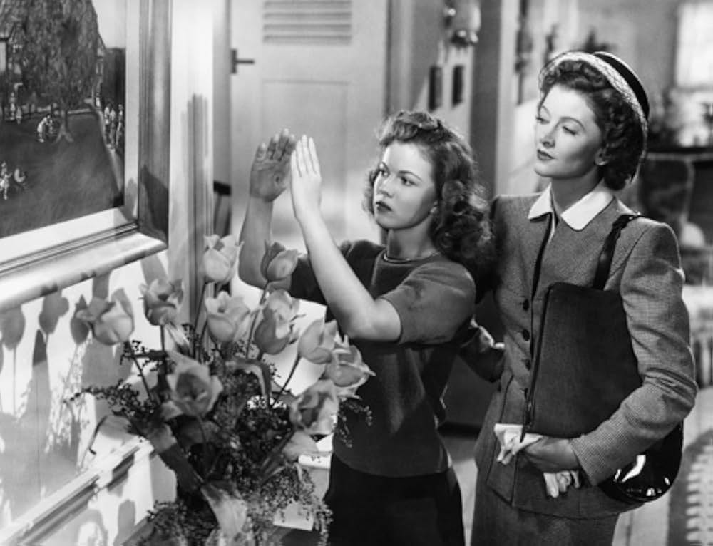 独身者と女学生の画像