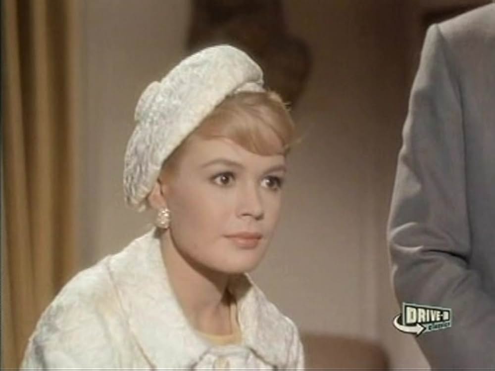 彼女は億万長者の画像