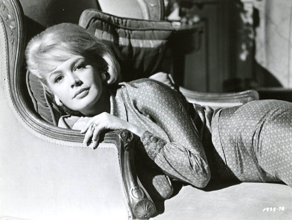 彼女は億万長者の画像