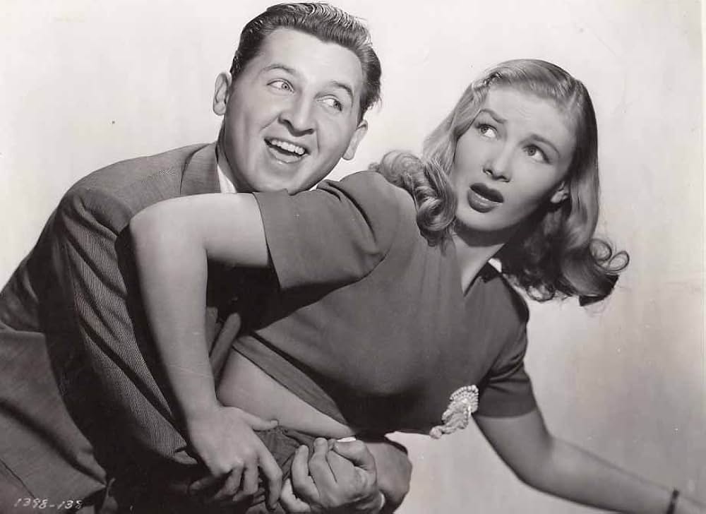 頓馬と金髪娘の画像