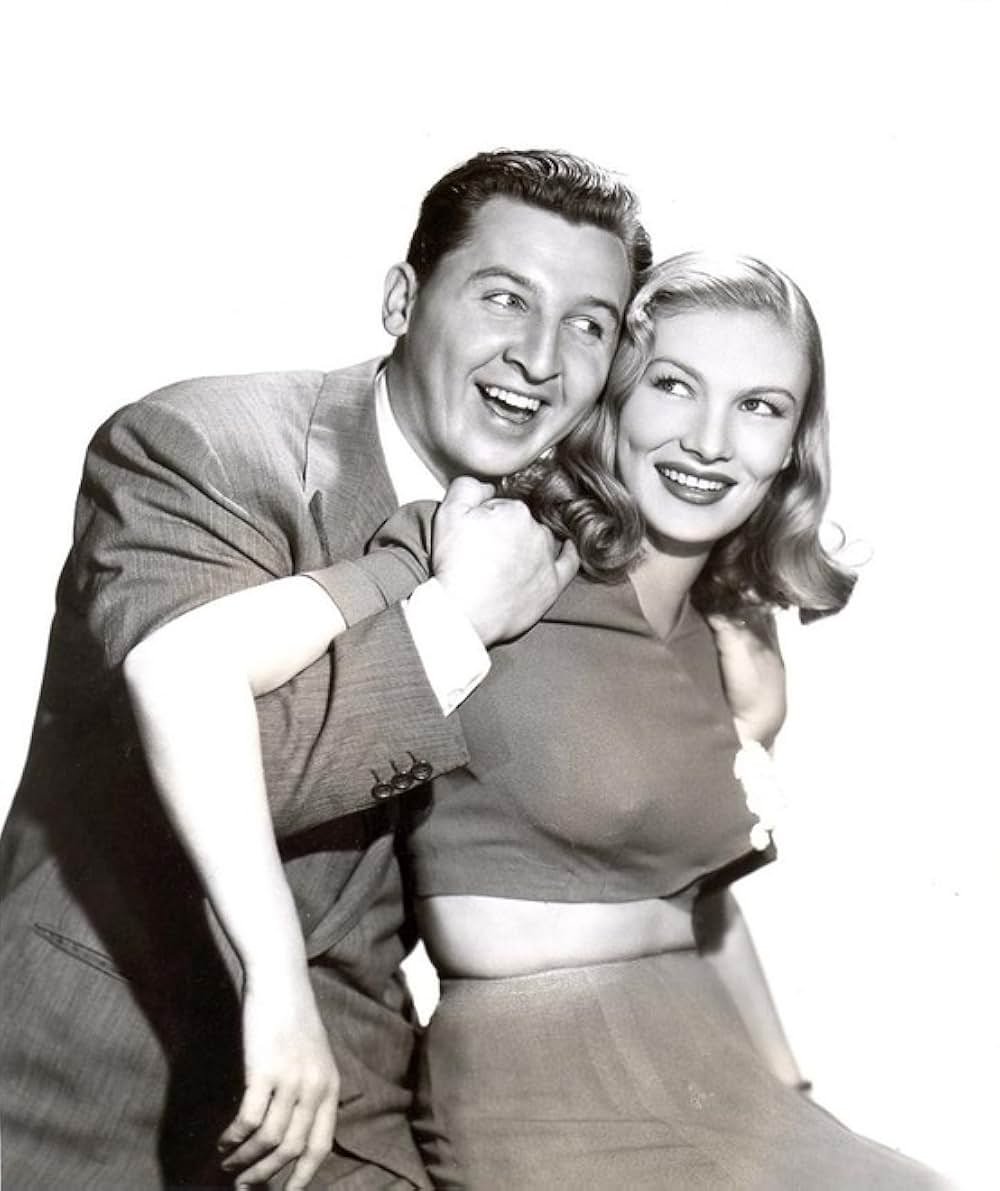 頓馬と金髪娘の画像