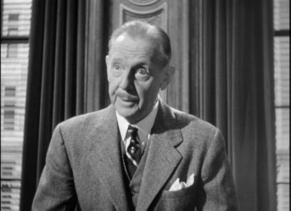 頓馬と金髪娘の画像