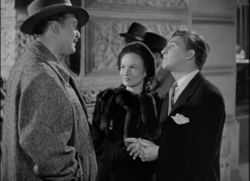 頓馬と金髪娘の画像