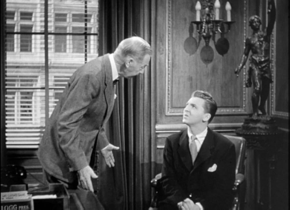 頓馬と金髪娘の画像