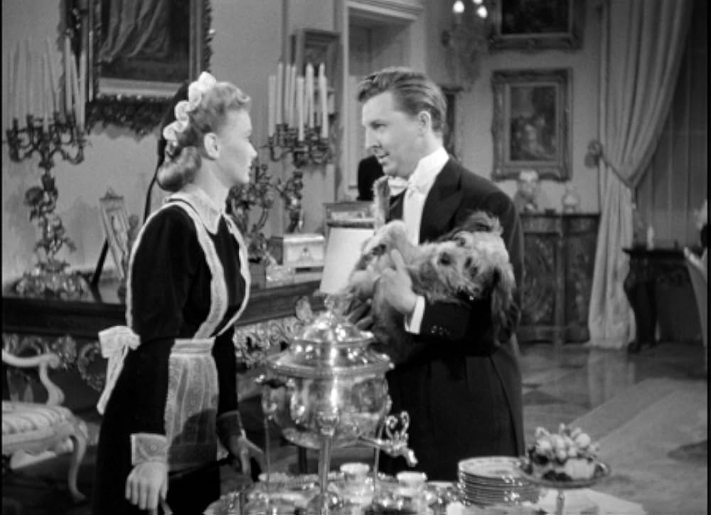 頓馬と金髪娘の画像