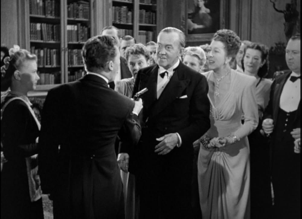 頓馬と金髪娘の画像