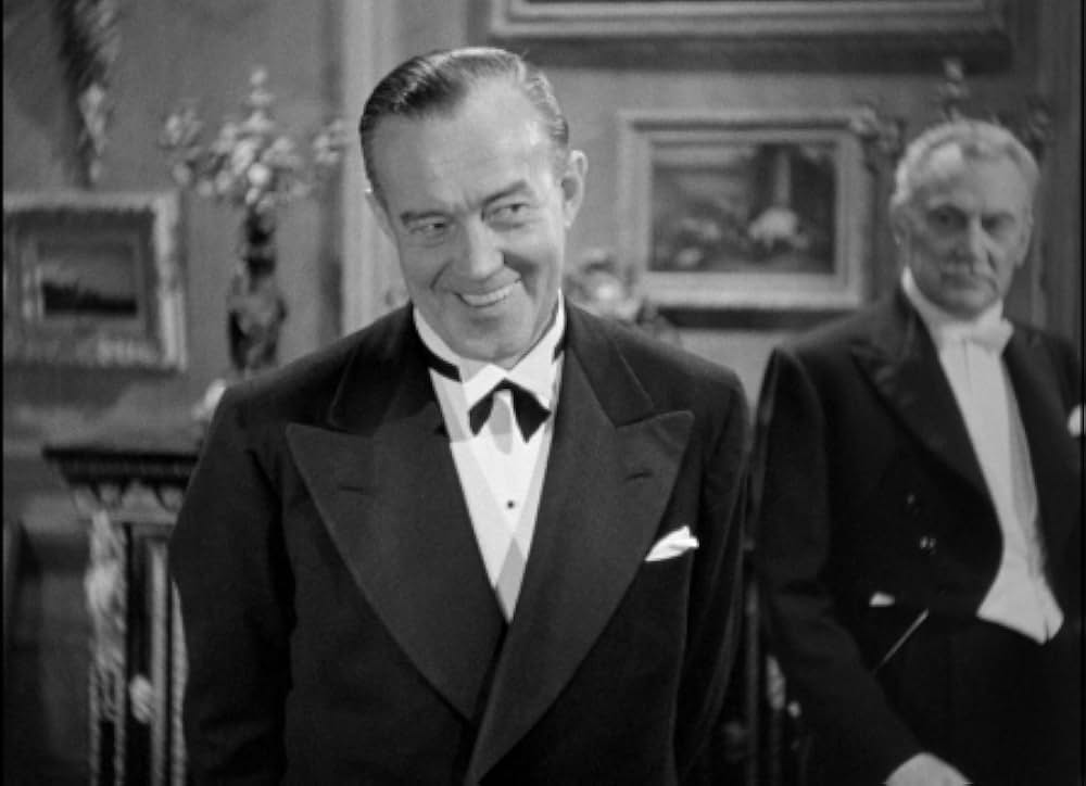 頓馬と金髪娘の画像