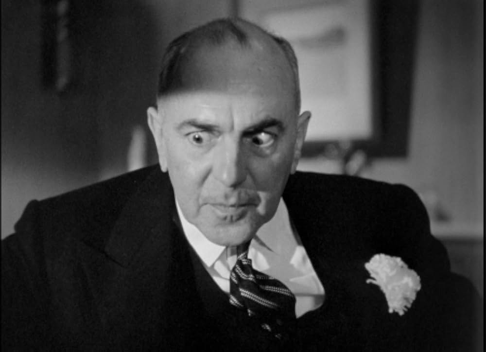 頓馬と金髪娘の画像