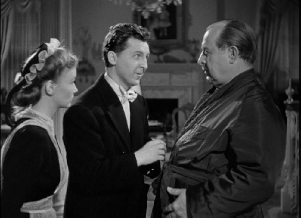 頓馬と金髪娘の画像