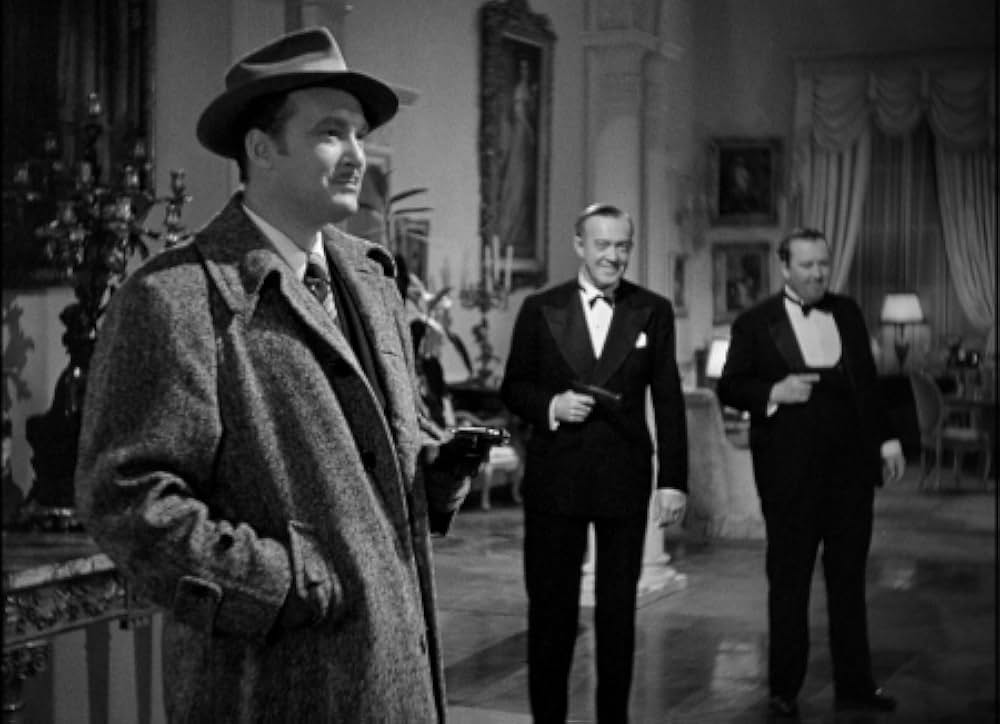 頓馬と金髪娘の画像