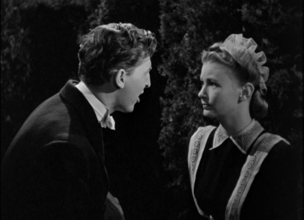 頓馬と金髪娘の画像