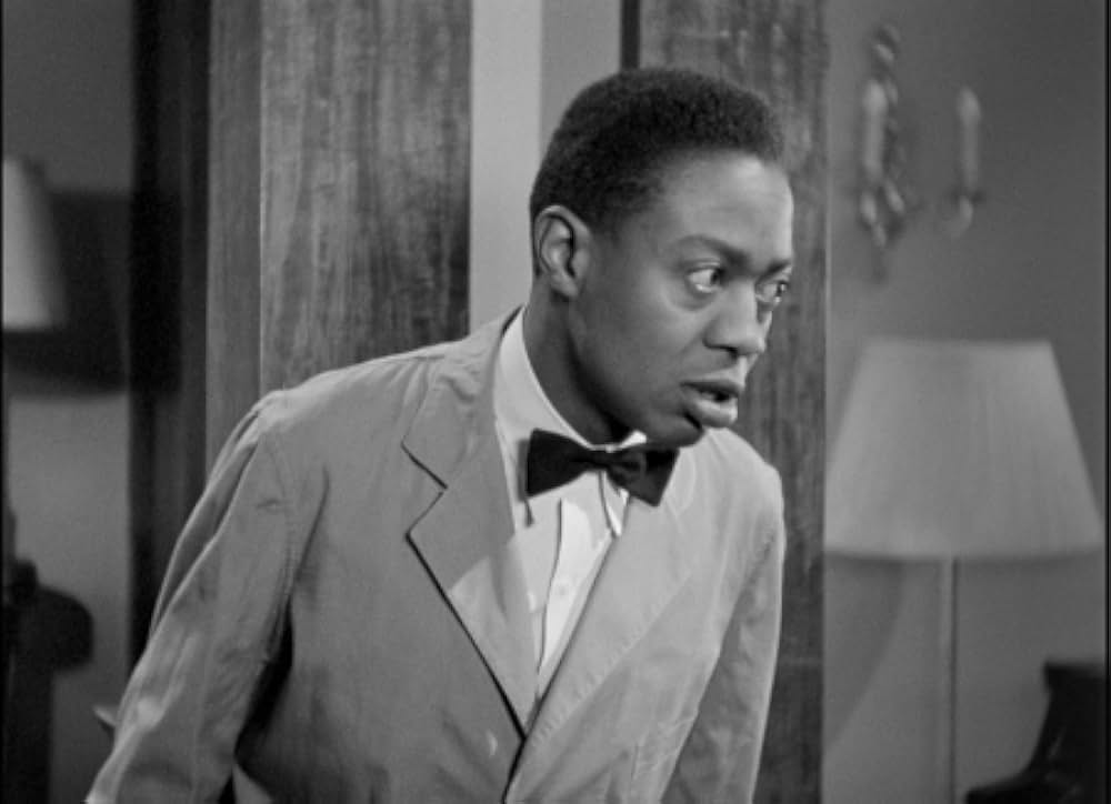 頓馬と金髪娘の画像