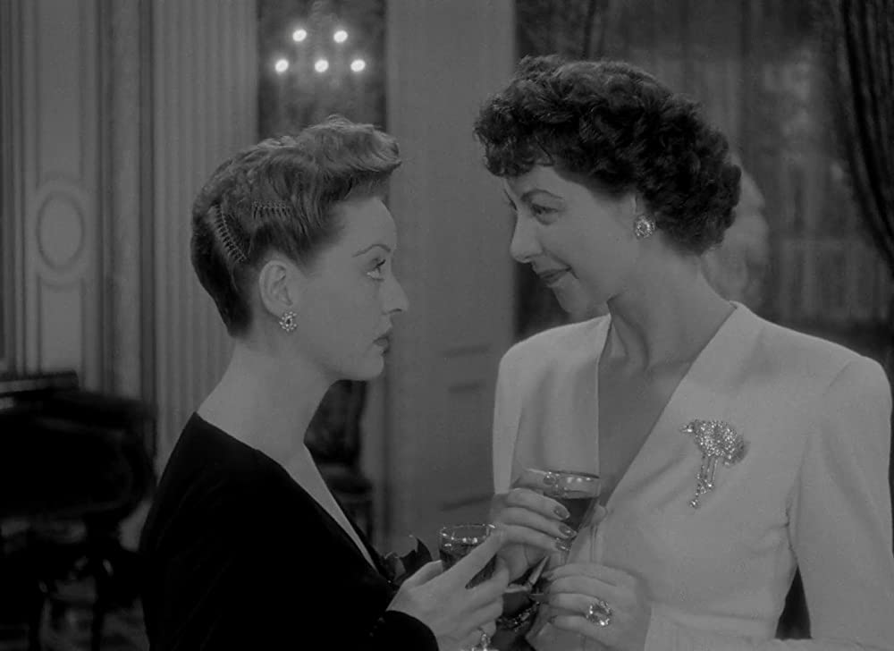 「情熱の航路」ベティ・デイビス & イルカ・チェイスの画像