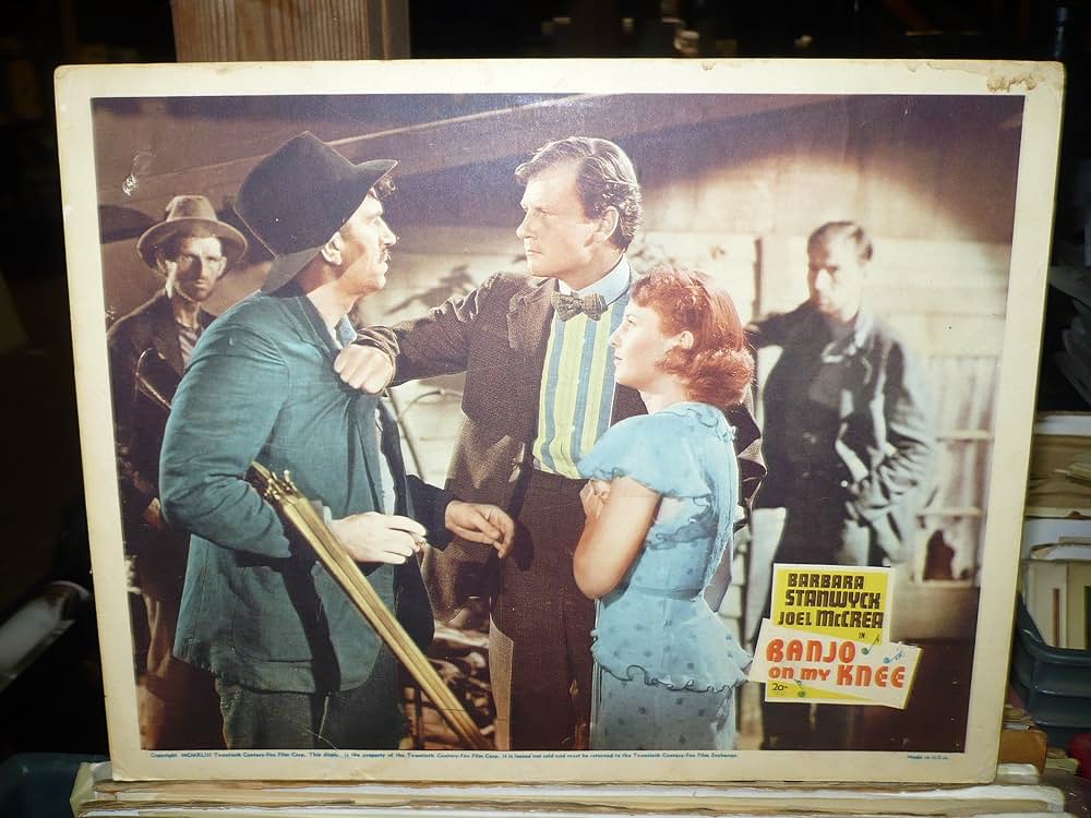 膝にバンジョーの画像