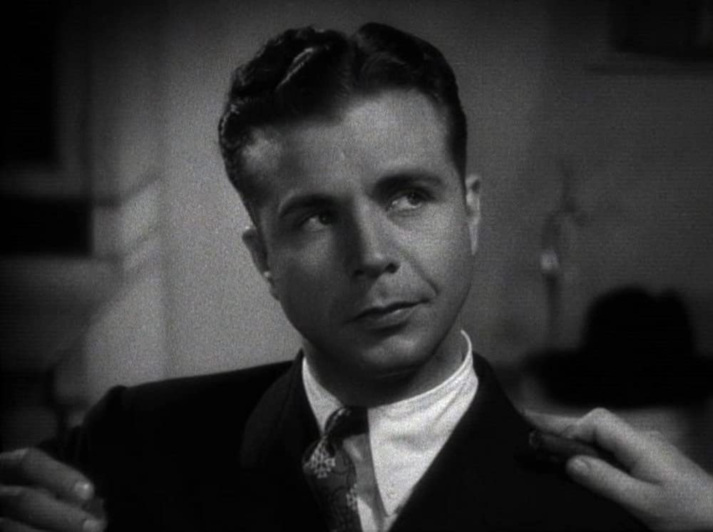 「サンクス・ア・ミリオン」ディック・パウエルの画像