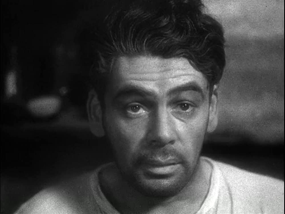 「仮面の米国」ポール・ムニの画像