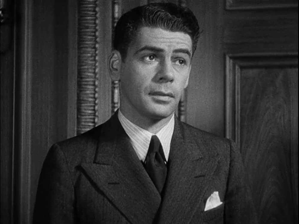 「仮面の米国」ポール・ムニの画像