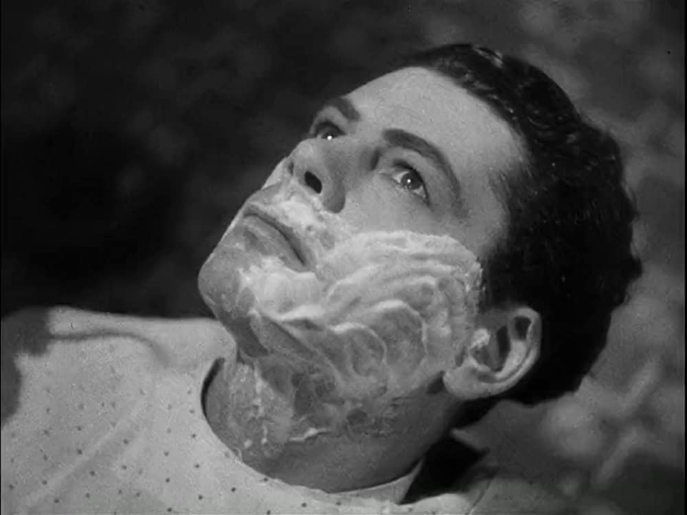 「仮面の米国」ポール・ムニの画像