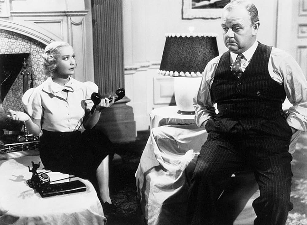 木に攀る女の画像