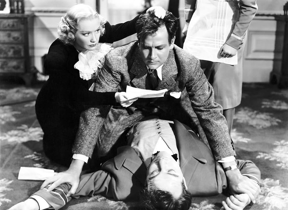 木に攀る女の画像