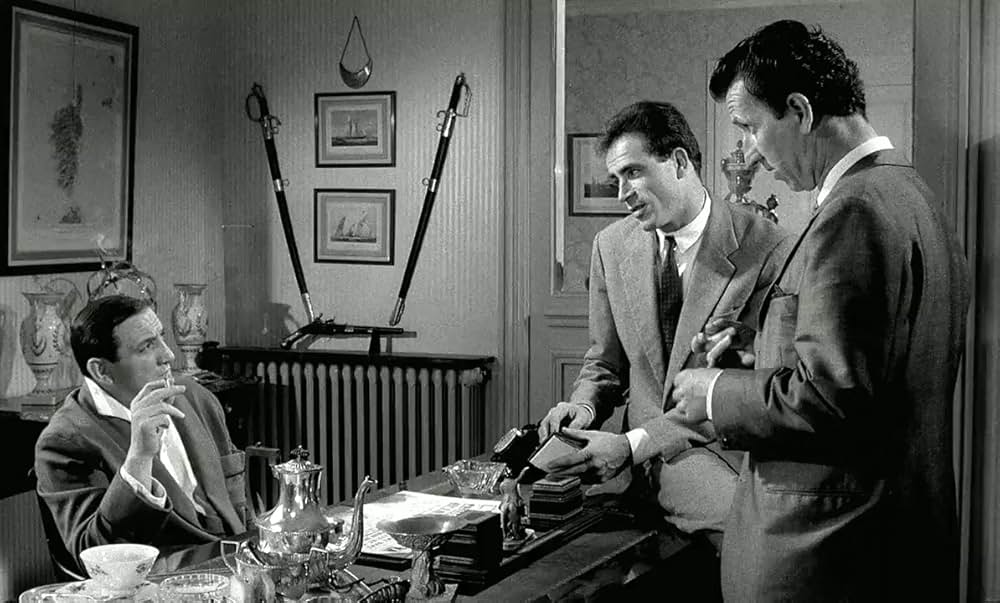 ハジキを持ったおじさんたちの画像