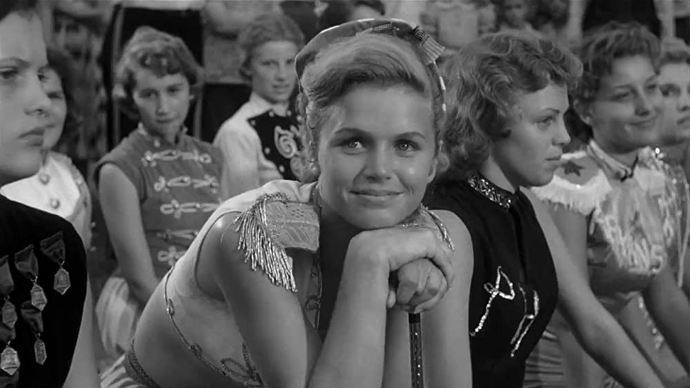 「群衆の中の一つの顔」リー・レミックの画像