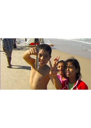 ガザにてハサンとのポスター